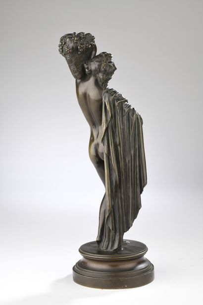 null James Pradier (1790-1852)
Nude woman carrying a basket 
Bronze with brown patina
Signed...