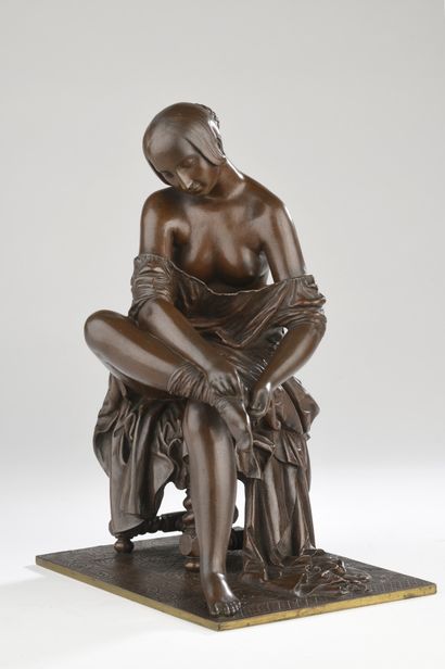 James Pradier (1790-1852) 
Femme mettant...