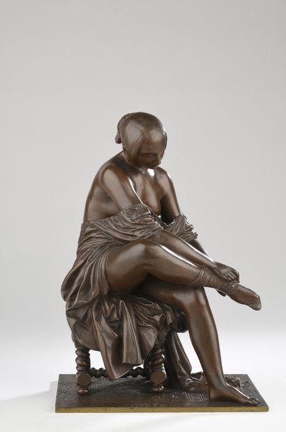 null James Pradier (1790-1852) 
Woman putting on her stocking
Circa 1850
Bronze with...