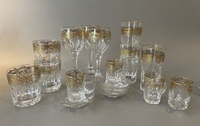 null Set of glasses with gold foliate scroll decoration including:
-18 water glasses...