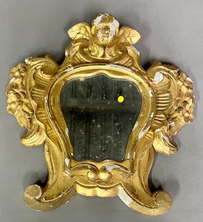 null Pair of small Baroque-style violin-shaped mirrors in carved and gilded wood,...