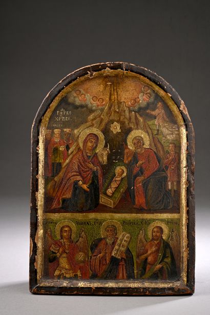  Two-register ICON depicting the Nativity surmounted by Saint Joseph flanked by Archangel... Gazette Drouot