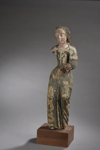 null STATUE en pierre sculptée polychrome représentant une jeune femme.

Fin du XVIème...