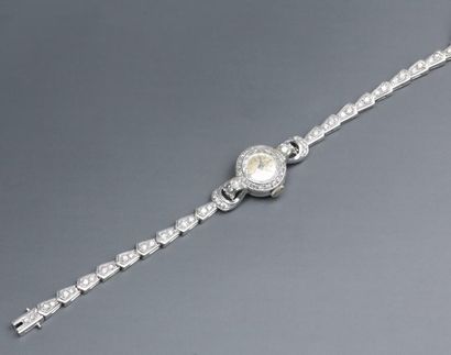 null Une montre de poignet pour dame en or gris, 14K 585‰, sertie de diamants brillantés...