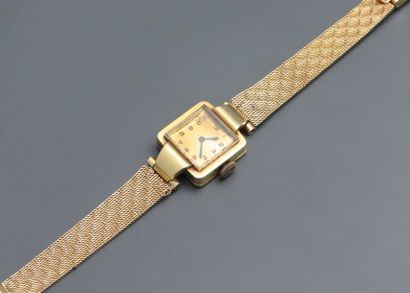null Une montre de poignet pour dame en or jaune 18K 750‰, boîte carrée, chiffres...