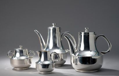null Service à thé et café en métal argenté composé de quatre pièces, théière, cafetière,
sucrier...