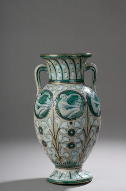 null METHEY André (1871-1920) 


	Vase balustre sur piédouche en faïence à deux anses...