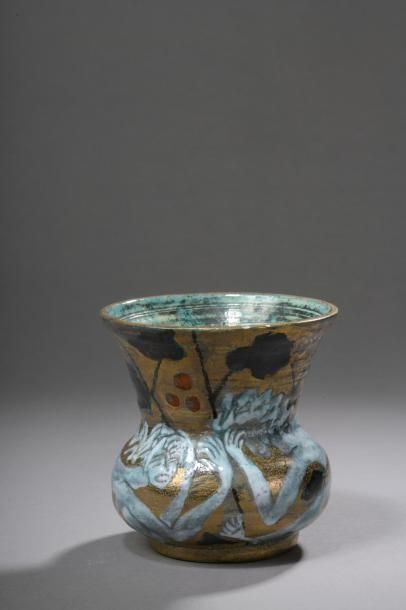 null CAZAUX Édouard (1889-1974) 


	Vase conique à base sphérique en céramique. Décor...