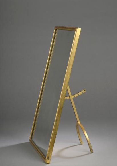 null DU PLANTIER Marc (1901-1975)


	Miroir rectangulaire en fer à patine dorée nuancée,...