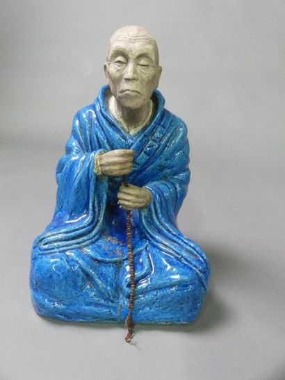 null Moine bouddhiste en terre cuite émaillée bleu turquoise.
Dynastie Qing, XIXe...