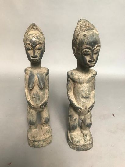 null Deux statues africaines de type Baoulé en bois sculpté
Manques
H : 69 et 71...