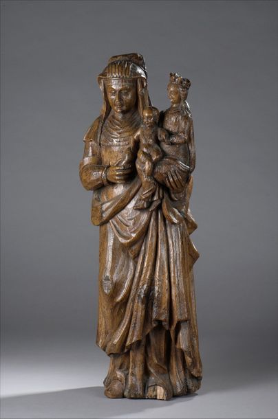 null Sainte Anne trinitaire en chêne sculpté


France, XVIIIè siècle


H. 81 cm