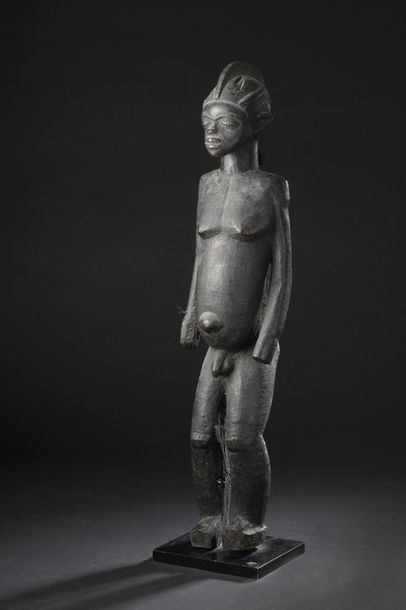 null STATUE LOBI, Burkina Faso


Bois à patine noire légèrement écaillée.


H. 63,5...