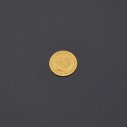  Pièce en or de 10 couronnes à l’effigie de François-Joseph, datée 1912. 
Poids...