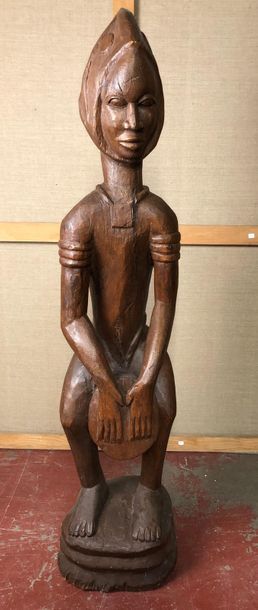 Sculpture en bois représentant un joueur...