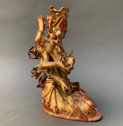 null Prajnaparamita en bronze doré.
H. 21 cm