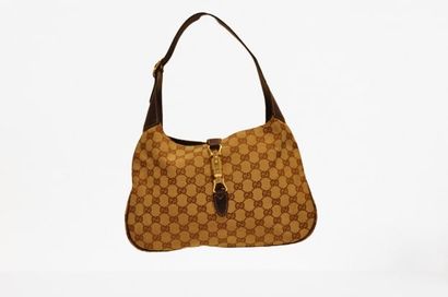 null GUCCI : Bag " Jackie ", 31 cm in beige canvas and brown leather, shoulder strap,...