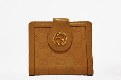 null GUCCI : Wallet with double flap in beige Guccissima leather, 

pressure closure....