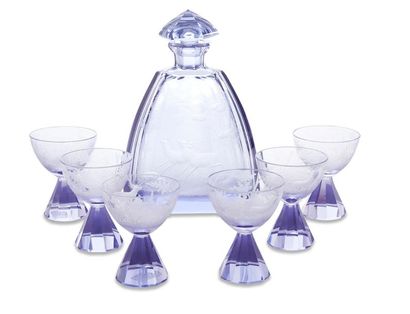 null Service à liqueur en cristal de Bohême

violet composé de six verres à décors

gravés...