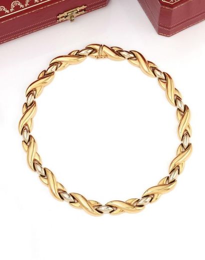 null Cartier
Arabesques 
Collier en deux tons d’or 18K (750/1000) jaune et gris
Accompagné...