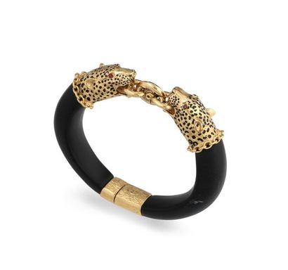 Gold-plated metal and blackened wood bracelet...