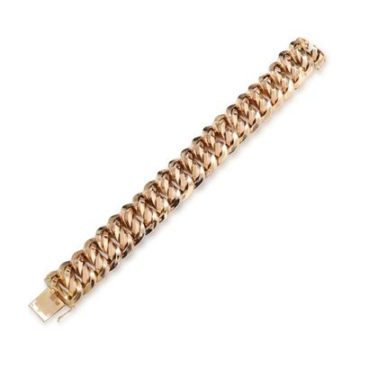 null 18K (750/1000) yellow gold bracelet with partially braided curb chain. Ratchet...