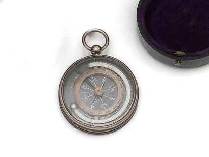 A two-sided pocket compass compass comprising...