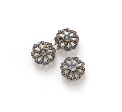 null 
Three 18K (750/1000) yellow gold and silver (800/1000) buttons with an openwork...