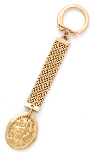 null 18K (750/1000) yellow gold key ring with a rice chain holding a Saint Christopher...