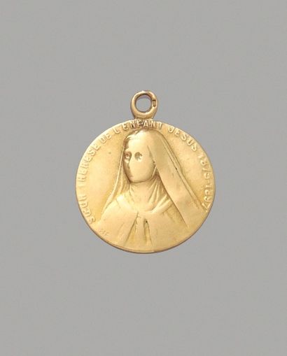Médaille de la Vierge en or jaune 18K (750/1000)....