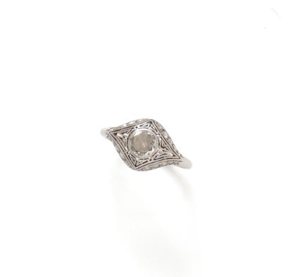 null A platinum ring (850/1000) centered on a half-size diamond weighing approximately...