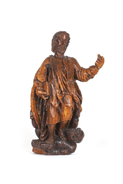 Saint Bartholomew in carved wood with remains...