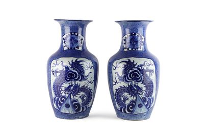 null Vietnam, 19th century 

A pair of ceramic vases with powder blue glaze and decoration...