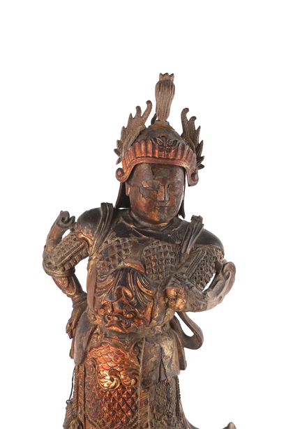 null Chine, période Kangxi

Importante sculpture d’un gardien en bois laqué et doré....
