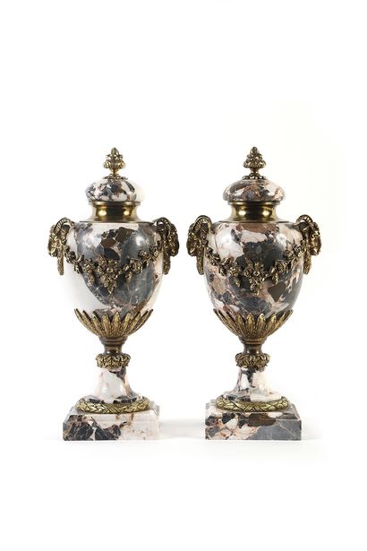 A pair of breccia marble ornamental vases,...