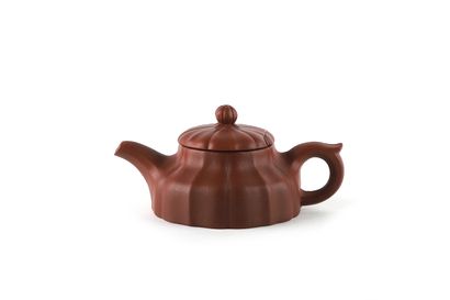 null China 20th century 

Set of four Yixing stoneware teapots, two of which are...