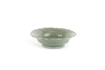 China, Ming period and earlier 

A celadon-glazed...