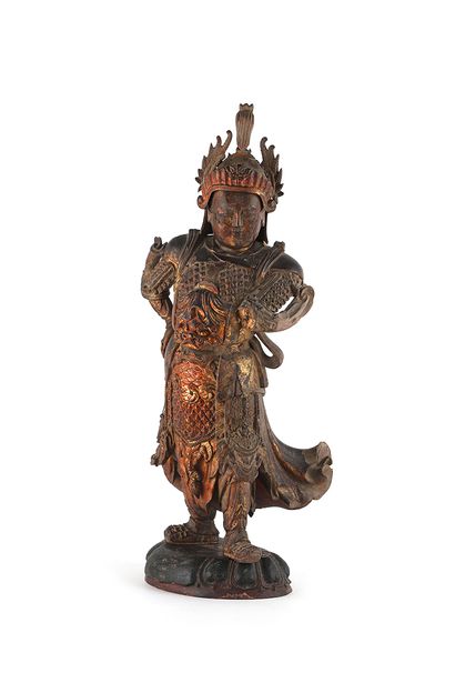null Chine, période Kangxi

Importante sculpture d’un gardien en bois laqué et doré....