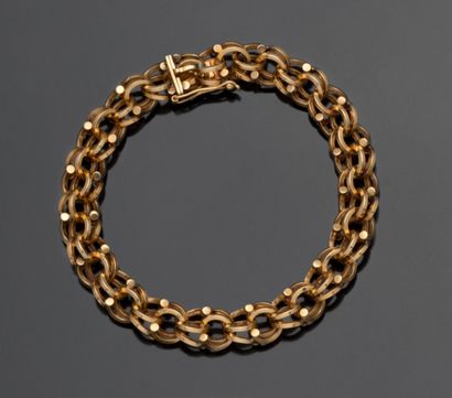 null Gourmette en or jaune 18K (750/1000) composée d'anneau en spirale entrelacés....