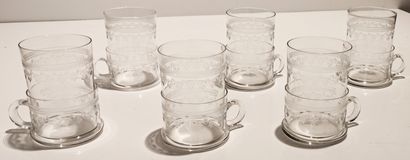 null Six glass holders and its tea glasses in blown glass.

Saint Petersburg glassworks,...