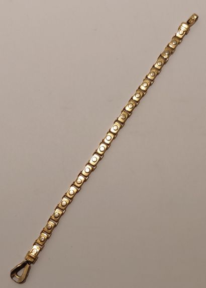 null Men's bracelet in 18K yellow gold (750/1000) composed of rectangular links stylizing...