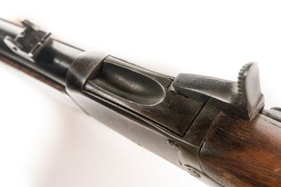 null Peabody rifle, caliber 52 

Round barrel with rise. Walnut stock. One strap...