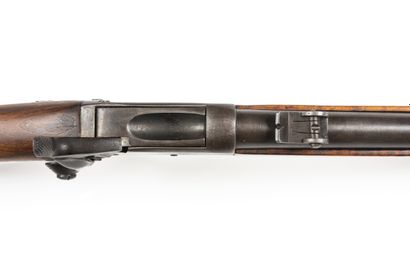 null Peabody rifle, caliber 52 

Round barrel with rise. Walnut stock. One strap...