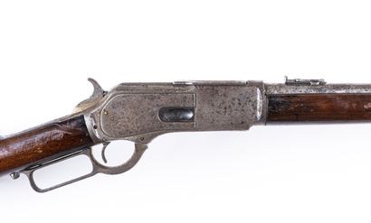 null Carabine Winchester modèle 1876 calibre 45-75 WCF.

Canon rond avec marquages...