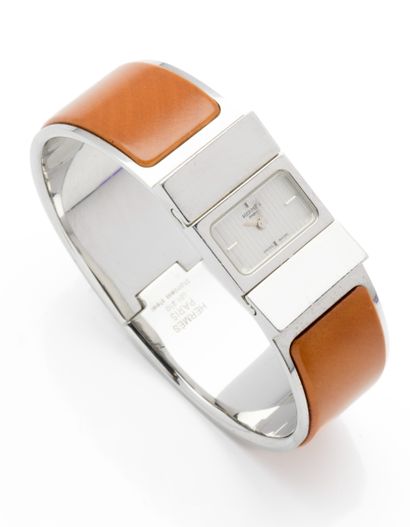 null HERMÈS LOQUET

Ladies' wristwatch in steel, silver dial with vertical patterns,...