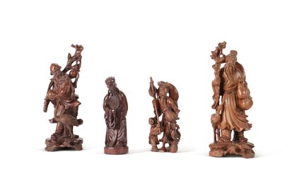 CHINE, XXe siècle
Ensemble de quatre statues...