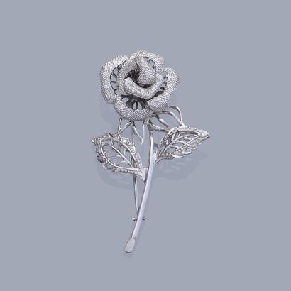 null Broche en or gris 18K 750% en forme de fleur sertie de petits diamants taille...