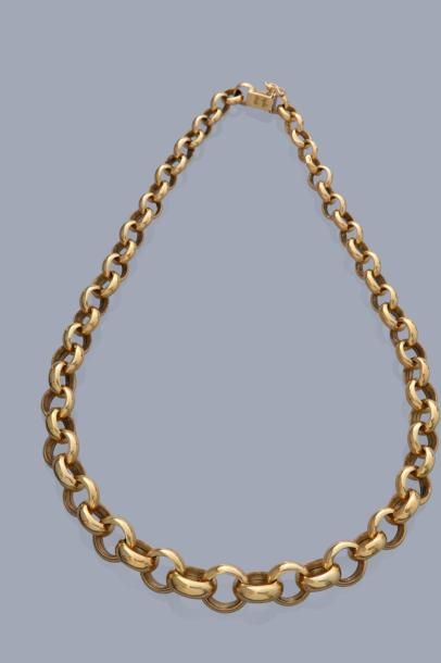 null Collier en or jaune 18K 750% à mailles jaserons décroissantes. Fermoir à cliquet...