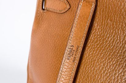 null HERMES Paris made in France : 

Sac Kelly en cuir grainé camel, attaches et...