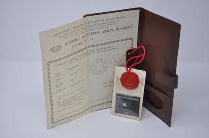 null Diamant 0,59 ct G, sous blister, certificat UD 1981